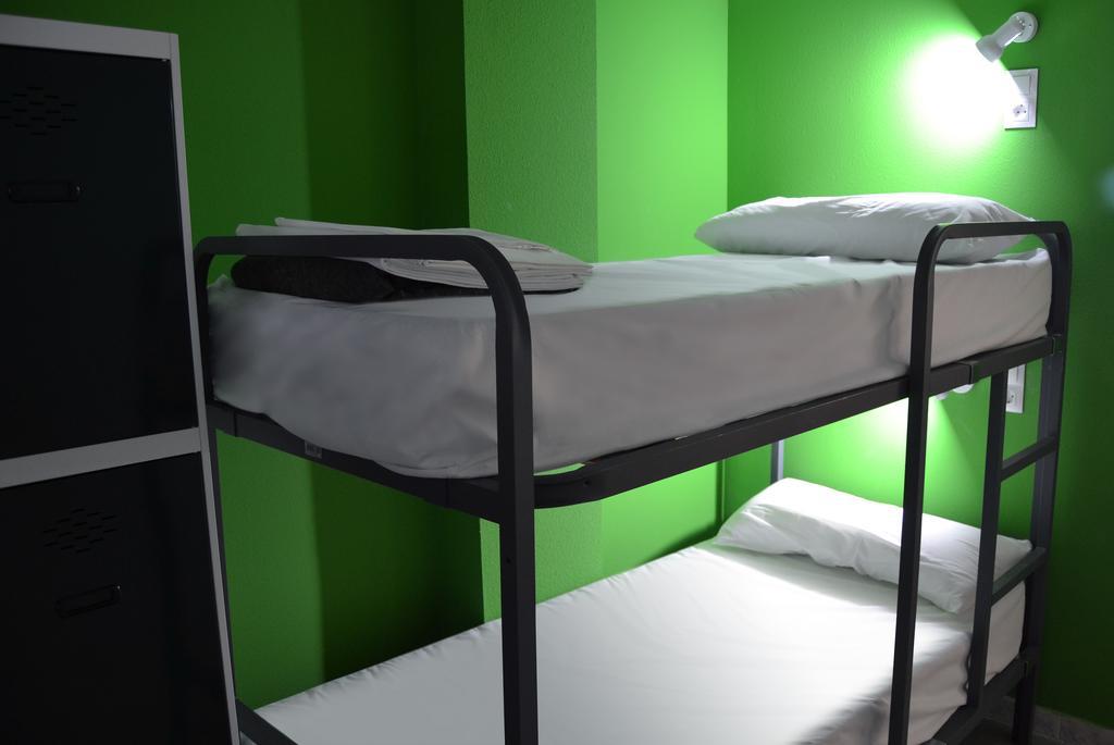Cama en habitación compartida de 8 camas